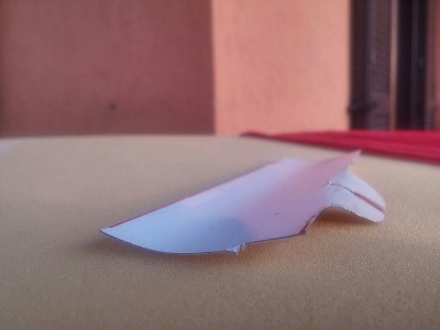 conveyor paper template - note curvature<br />actual plastic piece was warmed to 60°C in water to better conform to shape