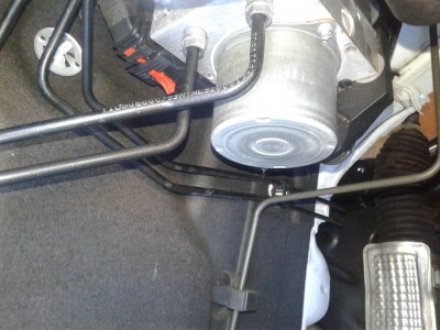 In this photo, the plastic clip is holding 2 brake fluid line running from the ABS/ESP Pump: